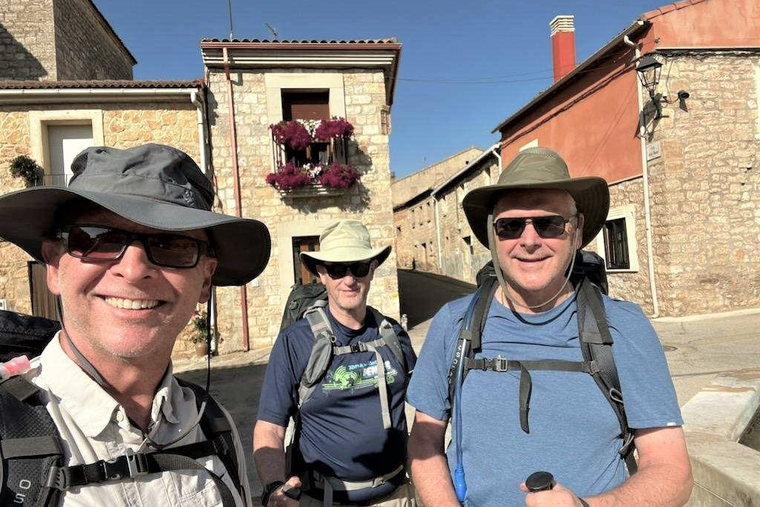 Archbishop Paul Coakley (r) and Bishops James Conley (c) and James Wall (l) bonded over their recent pilgrimage trek along the Camino.