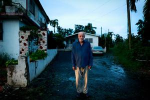 Wilson Aponte poses in front of his home on September 20, 2022 in Cabo Rojo, Puerto Rico. The island awoke to a general island power outage after Hurricane Fiona struck this caribbean nation two days ago. Wilson Aponte poses in front of his home on September 20, 2022 in Cabo Rojo, Puerto Rico. The island awoke to a general island power outage after Hurricane Fiona struck this caribbean nation two days ago.