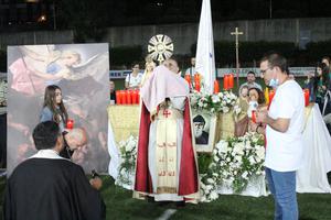 The ‘For Jesus and Mary’ gathering on Oct. 7 combined Eucharistic adoration, the Rosary and Marian hymns, concluding with the consecration of Lebanon to St. Michael the Archangel. Maronite Archbishop Elias Sleiman holds the Blessed Sacrament aloft. The ‘For Jesus and Mary’ gathering on Oct. 7 combined Eucharistic adoration, the Rosary and Marian hymns, concluding with the consecration of Lebanon to St. Michael the Archangel. Maronite Archbishop Elias Sleiman holds the Blessed Sacrament aloft.