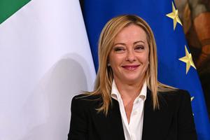 Italy's new prime minister, Giorgia Meloni, reacts during the cabinet minister bell handover ceremony at Palazzo Chigi in Rome on Oct. 23. Italy's new prime minister, Giorgia Meloni, reacts during the cabinet minister bell handover ceremony at Palazzo Chigi in Rome on Oct. 23.