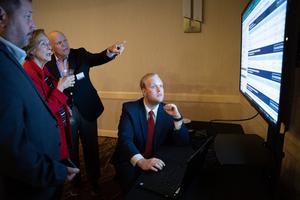 John Moncrieff operates a computer displaying voting results during an election night party on Tuesday for Republican Senate candidate U.S. Rep. Ted Budd at the Marriott Hotel in Winston-Salem, North Carolina. John Moncrieff operates a computer displaying voting results during an election night party on Tuesday for Republican Senate candidate U.S. Rep. Ted Budd at the Marriott Hotel in Winston-Salem, North Carolina.