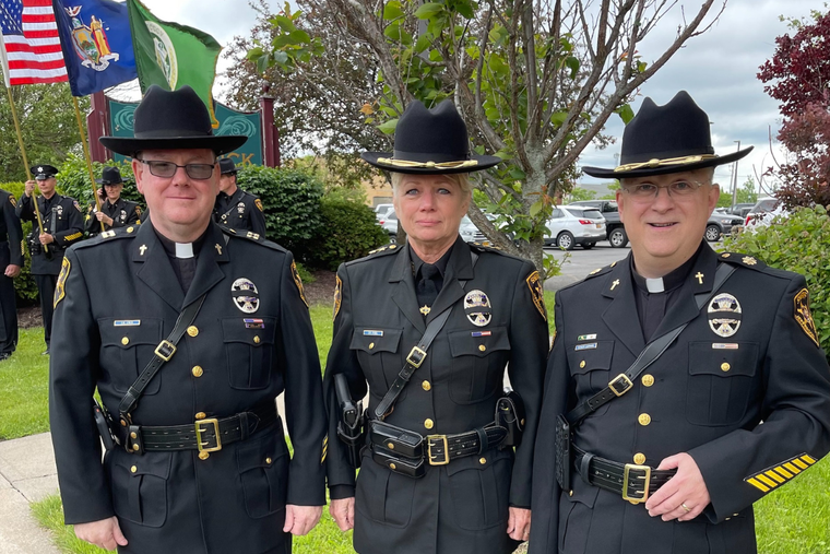 From left to right, Father Shane Lynch, Jefferson County Sheriff Colleen O'Neil and Father Christopher Carrara. Father Lynch and Father Carrara are chaplains to the agency in the Diocese of Ogdensburg, New York.