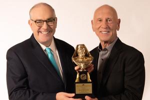 EWTN CEO Michael Warsaw (l) presents the 2022 Mother Angelica Award to Danny Abramowicz.