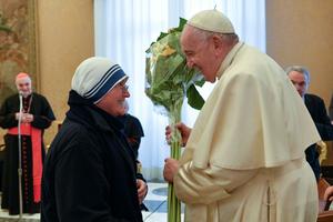 Pope Francis celebrates his 86th birthday with the Missionaries of Charity, honoring three people with the Mother Teresa Award on Dec. 17.