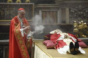 Cardinal Mauro Gambetti, the archpriest of St. Peter’s Basilica, presided over a brief ritual upon the arrival of Benedict XVI’s body in St. Peter's Basilica on Jan. 2, 2023, sprinkling the body with holy water and offering prayers for the repose of his soul.