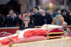 The mortal remains of Pope Emeritus Benedict XVI were moved early in the morning on Jan. 2, 2023, from his former residence in the Vatican's Mater Ecclesiae Monastery to St. Peter's Basilica, where the late pope is lying in state through Jan. 4. Thousands waited in line to pay their respects.