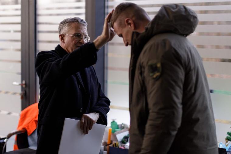 Archbishop Broglio blesses Sashko Lenevych, a lieutenant in the Armed Forces of Ukraine.