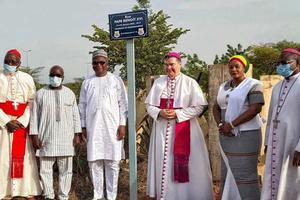 Apostolic Nuncio Archbishop Michael Crotty unveils the new sign of Pope Benedict XVI Street in Burkina Faso’s capital, Ouagadougou.