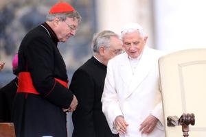 Pope Benedict XVI next to Cardinal George Pell during his weekly audience in St. Peter's Square on October 31, 2012 in Vatican City, Vatican. 