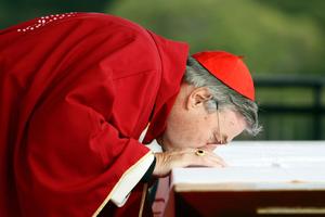 Cardinal George Pell, Catholic Archbishop of Sydney kisses the altar during the final Mass at Southern Cross Precinct during World Youth Day Sydney 2008 on July 20, 2008 in Sydney, Australia. Cardinal George Pell, Catholic Archbishop of Sydney kisses the altar during the final Mass at Southern Cross Precinct during World Youth Day Sydney 2008 on July 20, 2008 in Sydney, Australia.