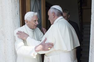 Pope Francis and Pope Emeritus Benedict embrace each other at the Vatican's Mater Ecclesiae Monastery, June 30, 2015.