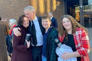 After being acquitted of federal charges by a jury in Philadelphia on Monday, Jan. 30, Mark Houck embraces and kisses his wife, Ryan-Marie Houck. Also with Houck are his son Mark Houck Jr., 14, and his daughter, Ava Houck, 12. After being acquitted of federal charges by a jury in Philadelphia on Monday, Jan. 30, Mark Houck embraces and kisses his wife, Ryan-Marie Houck. Also with Houck are his son Mark Houck Jr., 14, and his daughter, Ava Houck, 12.