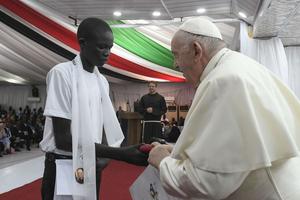 Pope Francis meets a boy living in an IDP camp during a gathering in Juba, South Sudan, on Feb. 4. Pope Francis meets a boy living in an IDP camp during a gathering in Juba, South Sudan, on Feb. 4.