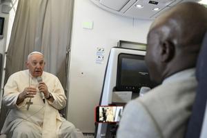 Pope Francis speaks to journalists on Feb. 5 during his flight back to Rome after his visit to the Democratic Republic of the Congo and South Sudan. Pope Francis speaks to journalists on Feb. 5 during his flight back to Rome after his visit to the Democratic Republic of the Congo and South Sudan.