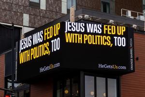 A HeGetsUs.com ad is shown in Washington, D.C.