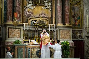 Priest celebrating the traditional Latin Mass in Rome. 