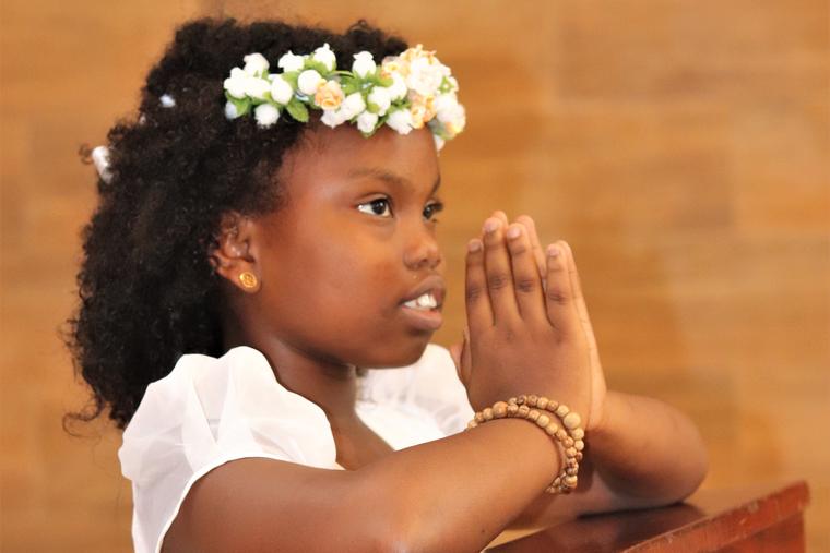 Receiving Christ in the Eucharist is a blessed sacramental milestone for young Catholics.