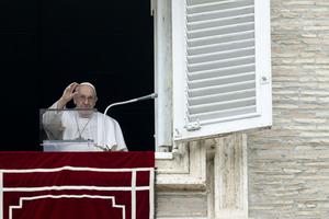 Pope Francis greets the crowd at his Angelus address on Feb. 19.