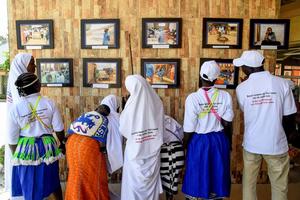 Women in search of separated family members view an exhibition of reconnected family members during an event to mark the International Day of the Disappeared in Yola, Adamawa State in northeast Nigeria, Aug. 30. Dozens of families of missing people, mostly victims of banditry and Boko Haram armed violence, came together to mark the International Day of the Victims of Enforced Disappearances, organized by the International Committee of the Red Cross (ICRC) and Nigerian Red Cross Society (NRCS). 