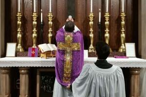 A Traditional Latin Mass is celebrated.