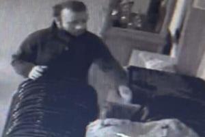 Police have released images from a surveillance camera of a suspect they say vandalized Our Lady of Lourdes Catholic Church in Gales Ferry, Connecticut, on March 11, 2023.