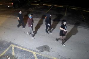 Surveillance footage shows suspects spray-painting pro-abortion slogans on the exterior of South Broward Pregnancy Help Center, a pro-life clinic in Hollywood, Florida, on May 28, 2022.