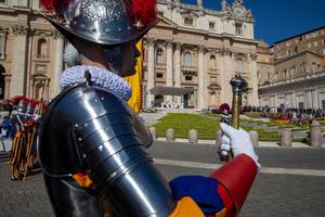 Swiss guards outside on a sunny Easter morning in Vatican City. 