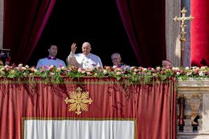 Pope Francis greets the faithful on Easter morning April 9, 2023. 