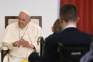 Pope Francis smiles during a meeting on April 29, 2023, with children and adults who are visually impaired and have other disabilities at a Catholic institute in Budapest, Hungary, dedicated to Blessed László Batthyány-Strattmann.