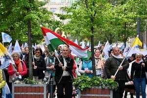 The faithful are shown on their way to the papal Mass, celebrated in Budapest, Hungary, in the early hours of Sunday, April 30.