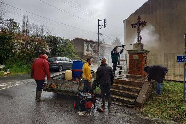 S.O.S. Calvaires, a French lay group, restores a crucifix in France. The group says it aims to restore the artistic and religious heritage of France.