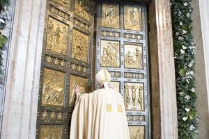 Pope Francis opens the Holy Doors at St. Peter's Basilica to begin the Year of Mercy, Dec. 8, 2015.