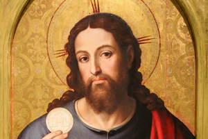 Detail of a medieval painting in Valencia, Spain, depicts Jesus Christ holding the Eucharist.