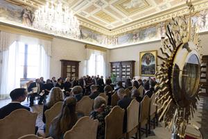 Above, the Pope meets with members of the U.S. bishops’ committee for the National Eucharistic Congress on June 19 at the Vatican. The Pope blessed a large monstrance (shown at right) that will be used to house Our Lord during the National Eucharistic Congress next year.