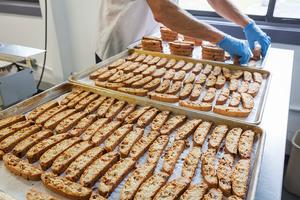 Monks’ Sea Salt Caramel Biscotti is stacked for packaging