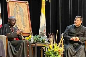 L to R: Cardinal Robert Sarah speaks alongside Father Guillermo Gutiérrez at the lecture at La Salle University in Mexico City on June 26.