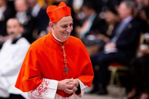 Cardinal Matteo Maria Zuppi, Archbishop of Bologna, Italy, after receiving the red biretta from Pope Francis during an Ordinary Public Consistory for the Creation of New Cardinals in St. Peter's Basilica on Oct. 5, 2019.