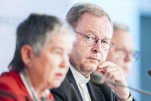 Bishop Georg Bätzing watches ZdK president Irme Stetter-Karp speak at the "Synodal Way" assembly in Frankfurt, Germany, Sept 8. 2022.