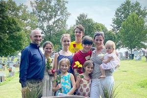 The Love family is pictured a couple of years ago, before their youngest, Edmund, was born.