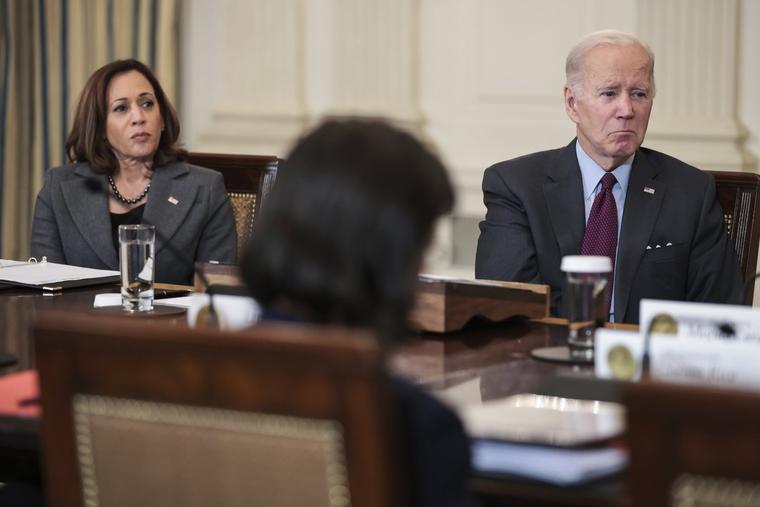 Vice President Kamala Harris and President Joe Biden listen during a meeting of the Task Force on Reproductive Healthcare Access in the the State Dining Room of the White House on October 4, 2022 in Washington, DC.