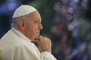 Pope Francis sits quietly during a meeting with students at the Portuguese Catholic University in Lisbon, Portugal, on Aug. 3, 2023.