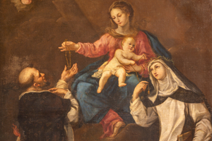 The Blessed Mother gives the rosary to St. Dominic in the 18th-century painting by Andrea Barbiani of the Madonna with St. Dominic and St. Catherine of Siena in the Basilica di Santa Maria del Porto in Ravenna, Italy. 