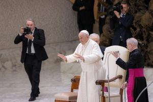 Pope Francis smiles at pilgrims during his Wednesday general audience in the Vatican's Paul VI Hall on Aug. 9, 2023.