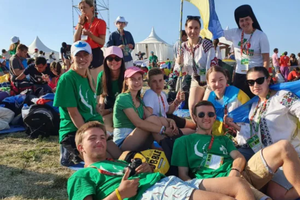 Marina Aleykseyeva, 31, from Kiev, Ukraine (second from left with a pink baseball cap), together with fellow pilgrims from Ukraine, attended World Youth Day in Lisbon, Portugal, Aug. 1-6. She said they traveled to the international gathering to pray for peace in their country.
