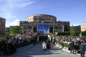 Pope Francis interacts with the crowd gathered outside the Cathedral of Sts. Peter and Paul on Sept. 2 in Ulaanbaatar, Mongolia.