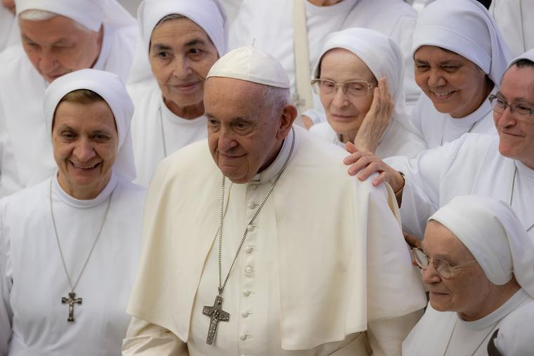 Women religious gather with Pope Francis during the Aug. 9 general audience. Women religious gather with Pope Francis during the Aug. 9 general audience.