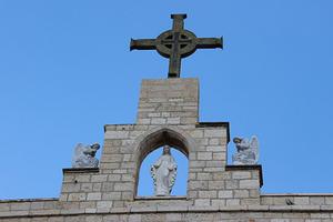 A cross atop the seminary in Beit Jala, Palestine