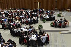 Synod on Synodality delegates meet in round table discussion groups Oct. 21, 2023.
