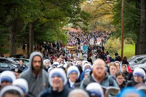 More than 8,000 faithful join the weekend Eucharistic procession.
