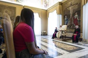 Pope Francis meets with a group of women who escaped criminal organizations in Italy on Oct. 30, 2023, at the Vatican.